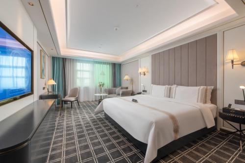 Imagen de la habitación del Hotel XANA Deluxe Guangzhou Xintang South High-speed Railway Station. Foto 18