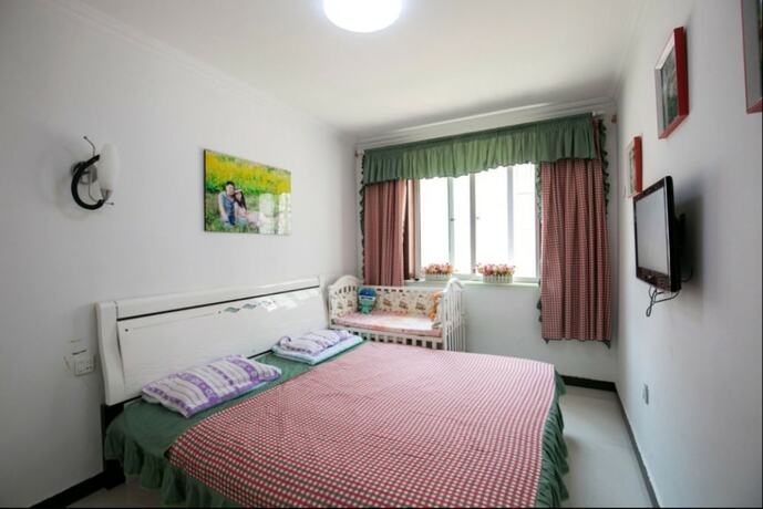 Imagen de la habitación del Hotel XIAOMIN INN Bihaijiayuan 4. Foto 8