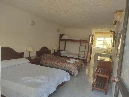 Imagen de la habitación del Hotel XILON RESORT MELGaR. Foto 20