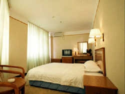 Imagen de la habitación del Hotel XINYANCHENG. Foto 1