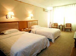 Imagen de la habitación del Hotel XINYANCHENG. Foto 2