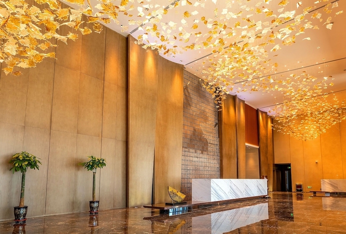 Imagen de los interiores del Hotel XINYU CROWN HOTEL. Foto 16