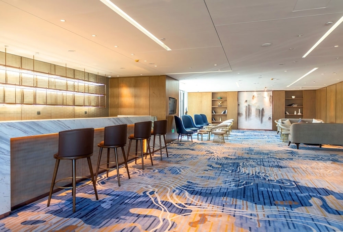 Imagen del bar/restaurante del Hotel XINYU CROWN HOTEL. Foto 2