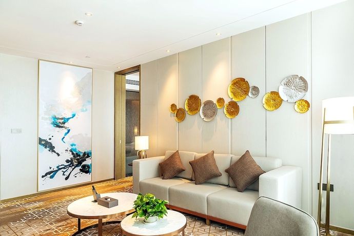 Imagen de la habitación del Hotel XINYU CROWN HOTEL. Foto 14