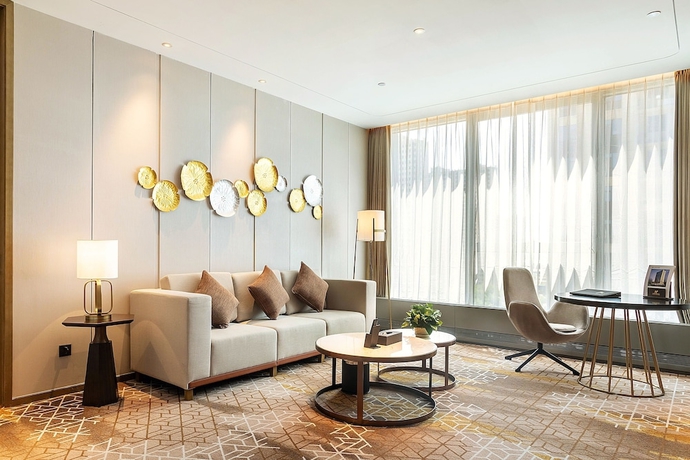 Imagen de la habitación del Hotel XINYU CROWN HOTEL. Foto 15