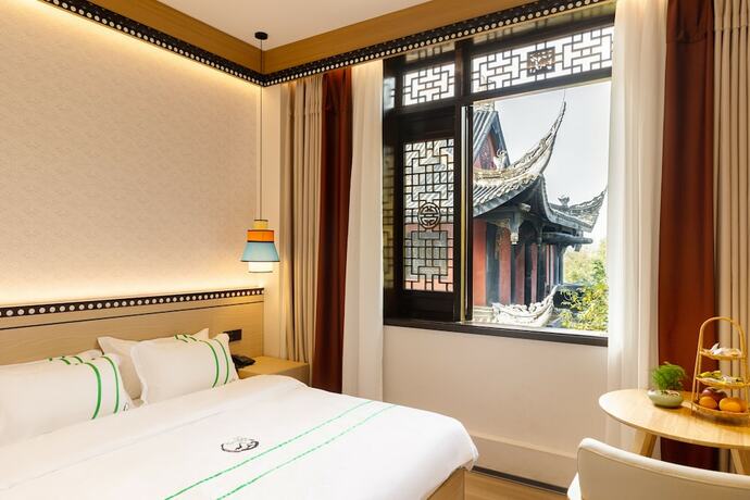 Imagen general del Hotel XISHU GARDEN INN. Foto 1