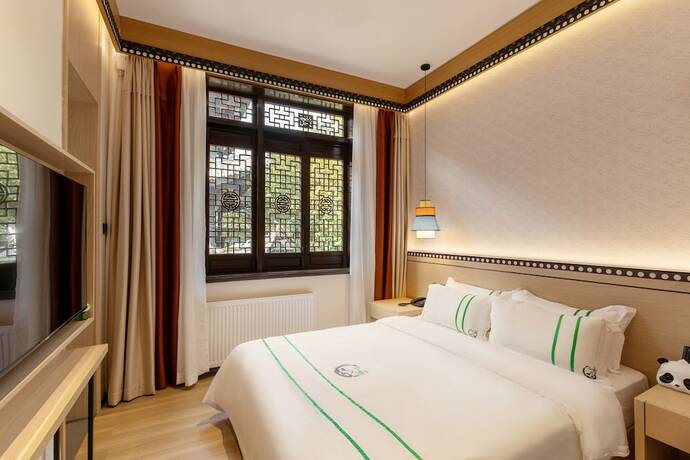 Imagen general del Hotel XISHU GARDEN INN. Foto 4