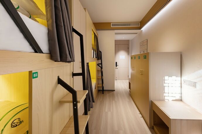 Imagen de la habitación del Hotel XISHU GARDEN INN. Foto 11