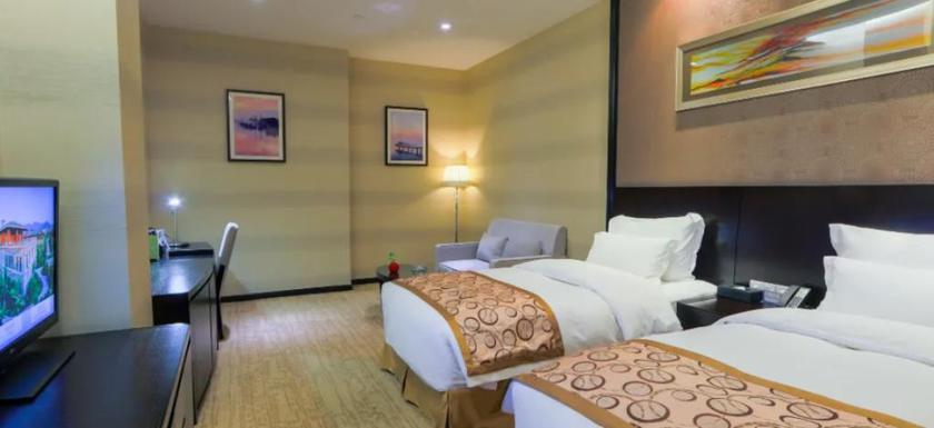 Imagen de la habitación del Hotel XIXI NADE RUNZEYUAN HOTEL. Foto 10