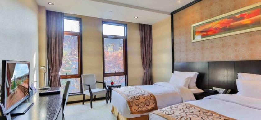 Imagen de la habitación del Hotel XIXI NADE RUNZEYUAN HOTEL. Foto 11