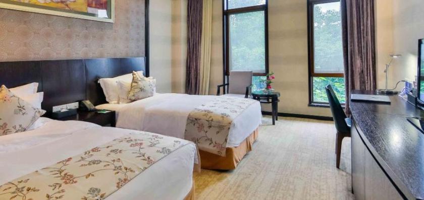 Imagen de la habitación del Hotel XIXI NADE RUNZEYUAN HOTEL. Foto 14