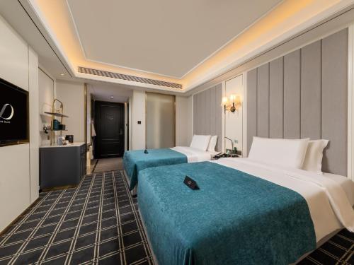Imagen de la habitación del Hotel Xana Deluxe Guangzhou Zhongshan Medical University Dongshankou. Foto 13