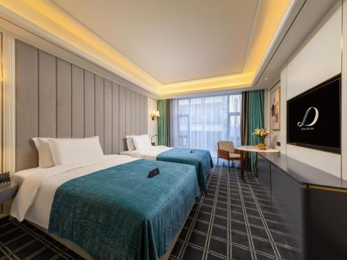 Imagen de la habitación del Hotel Xana Deluxe Guangzhou Zhongshan Medical University Dongshankou. Foto 19