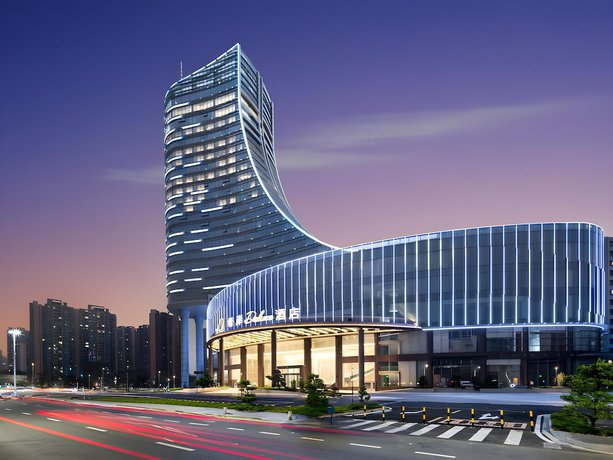 Imagen de los exteriores del Hotel Xana Deluxe Jiangmen Waihai Bridge. Foto 7