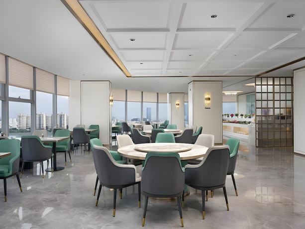 Imagen del bar/restaurante del Hotel Xana Deluxe Jiangmen Waihai Bridge. Foto 3