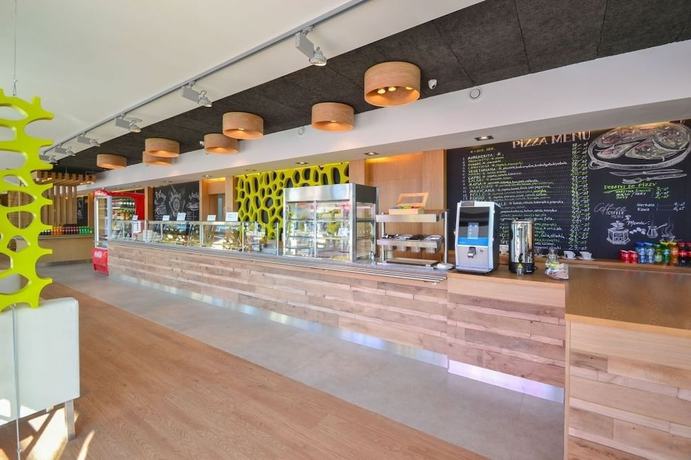 Imagen del bar/restaurante del Hotel Xanadu Resort - cottage. Foto 4