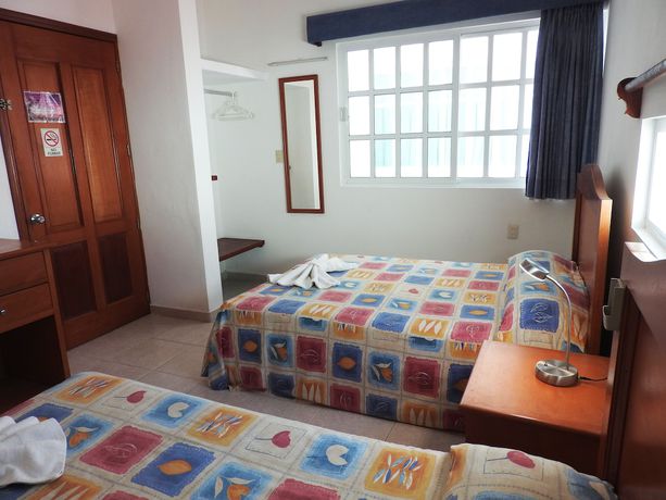 Imagen de la habitación del Hotel Xbulu-Ha. Foto 10