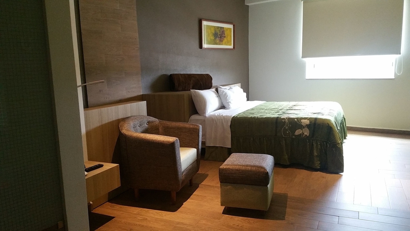 Imagen de la habitación del Hotel Xcoco Inn. Foto 5