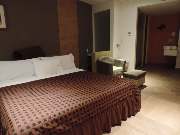 Imagen de la habitación del Hotel Xcoco Inn. Foto 7