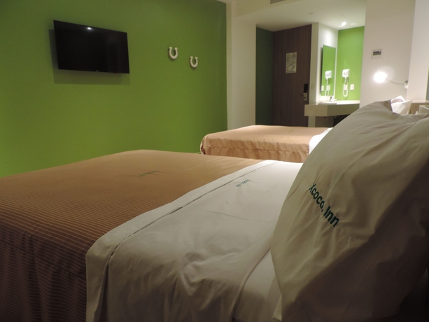 Imagen de la habitación del Hotel Xcoco Inn. Foto 9