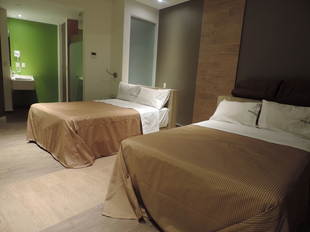 Imagen de la habitación del Hotel Xcoco Inn. Foto 13