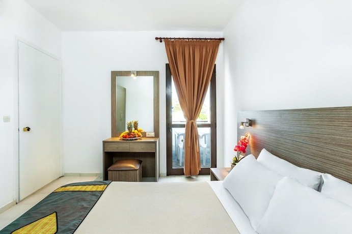 Imagen de la habitación del Hotel Xenios Dolphin Beach. Foto 7