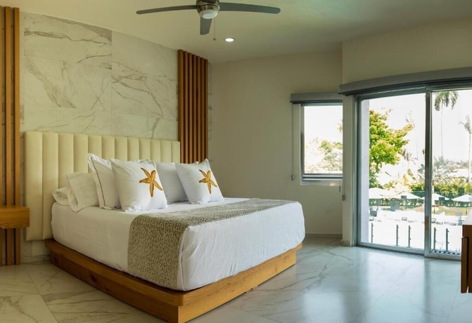Imagen de la habitación del Hotel Xhiara. Foto 6