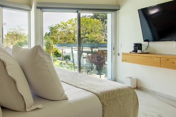 Imagen de la habitación del Hotel Xhiara. Foto 7
