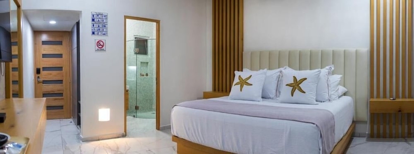 Imagen de la habitación del Hotel Xhiara. Foto 8
