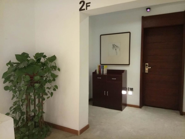 Imagen de la habitación del Hotel Xi, DALIAN. Foto 8