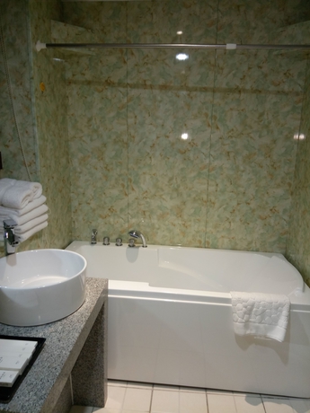 Imagen de la habitación del Hotel Xi, DALIAN. Foto 11