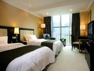 Imagen de la habitación del Hotel Xi Hua. Foto 3