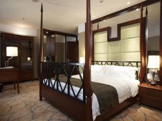 Imagen de la habitación del Hotel Xi Hua. Foto 4