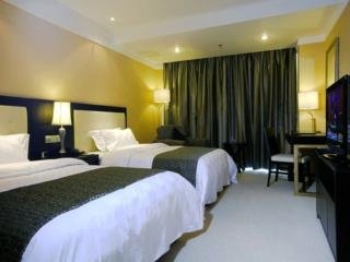 Imagen de la habitación del Hotel Xi Hua. Foto 5