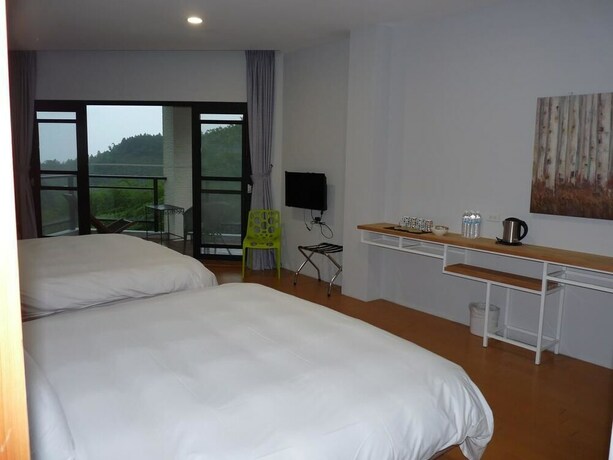 Imagen de la habitación del Hotel Xi Tou In Sunny Day Inn. Foto 21