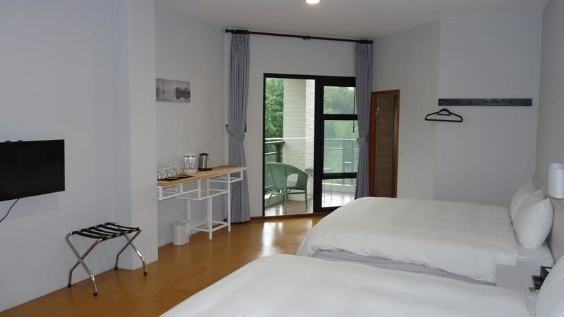 Imagen de la habitación del Hotel Xi Tou In Sunny Day Inn. Foto 25