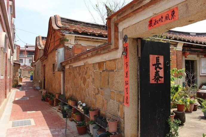 Imagen de los exteriores del Hotel Xia Xing Inn. Foto 31
