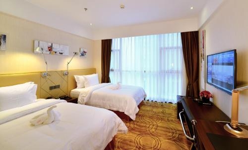 Imagen de la habitación del Hotel Xiamen Discovery. Foto 6