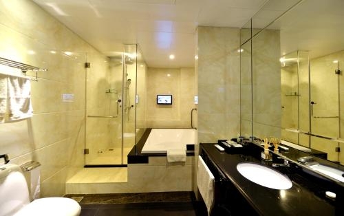 Imagen de la habitación del Hotel Xiamen Discovery. Foto 8