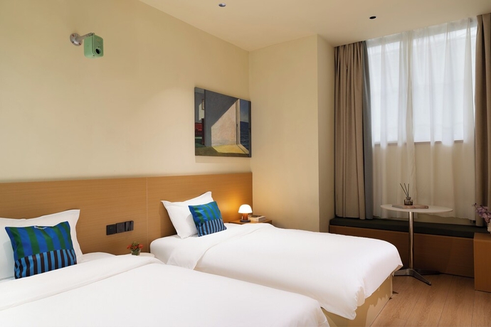 Imagen de la habitación del Hotel Xiamen Evening Breeze. Foto 2