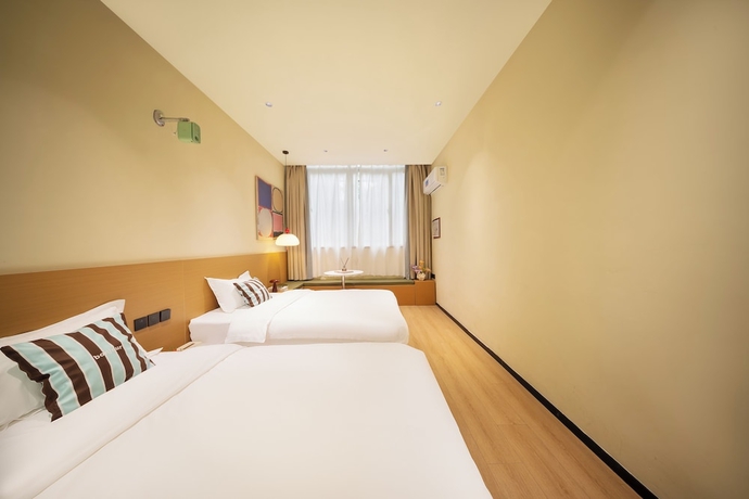 Imagen de la habitación del Hotel Xiamen Evening Breeze. Foto 6