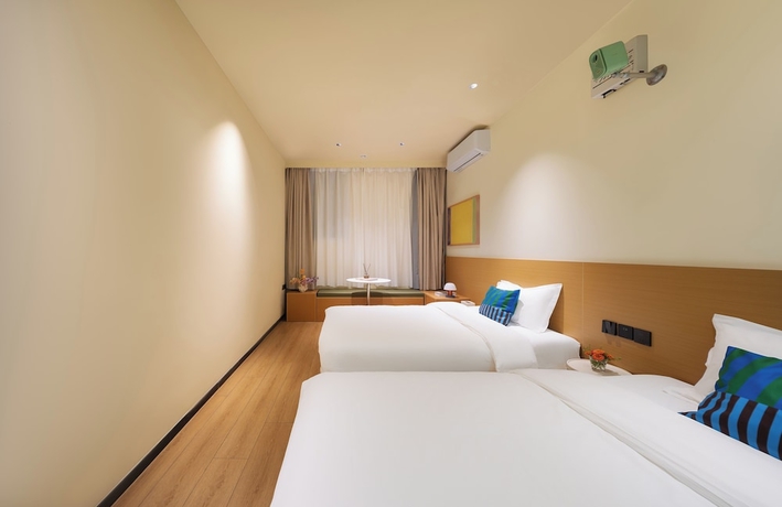 Imagen de la habitación del Hotel Xiamen Evening Breeze. Foto 8