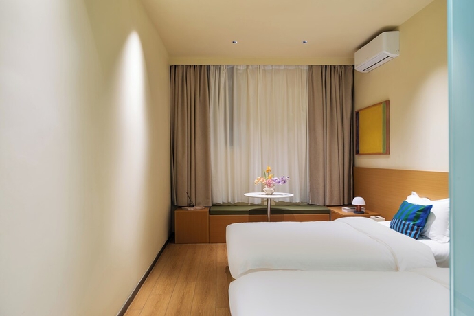 Imagen de la habitación del Hotel Xiamen Evening Breeze. Foto 9