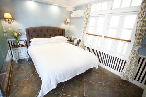 Imagen de la habitación del Hotel Xiamen Gulangyu Aifeier Guanglangyu Blue Isl. Foto 7