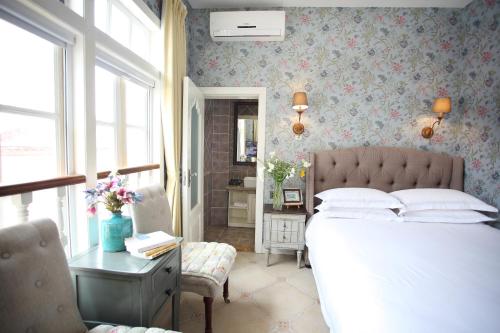 Imagen de la habitación del Hotel Xiamen Gulangyu Aifeier Guanglangyu Blue Isl. Foto 8