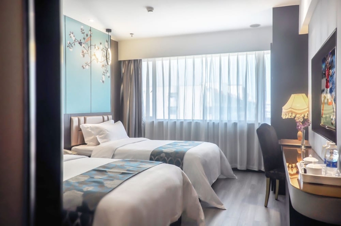 Imagen de la habitación del Hotel Xiamen Hooray. Foto 2