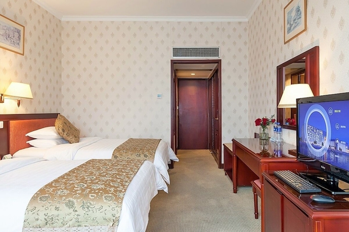 Imagen de la habitación del Hotel Xiamen Huaqiao. Foto 3