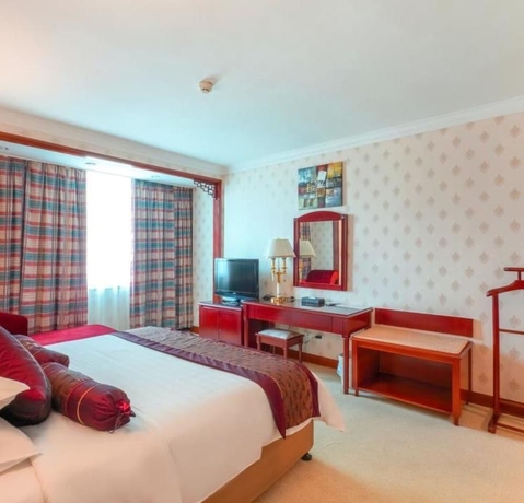 Imagen de la habitación del Hotel Xiamen Huaqiao. Foto 7