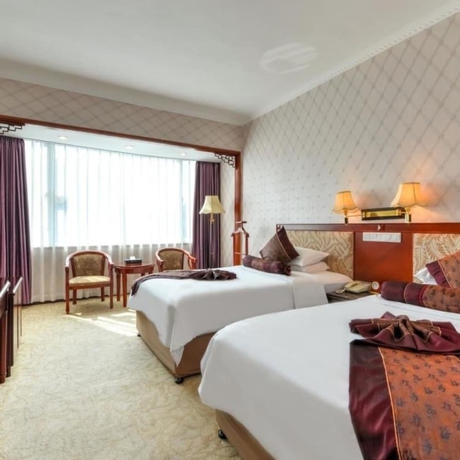 Imagen de la habitación del Hotel Xiamen Huaqiao. Foto 9