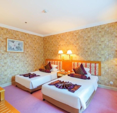 Imagen de la habitación del Hotel Xiamen Huaqiao. Foto 13